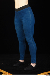 Ellie Springlare black sneakers blue jeans dressed leg lower body…